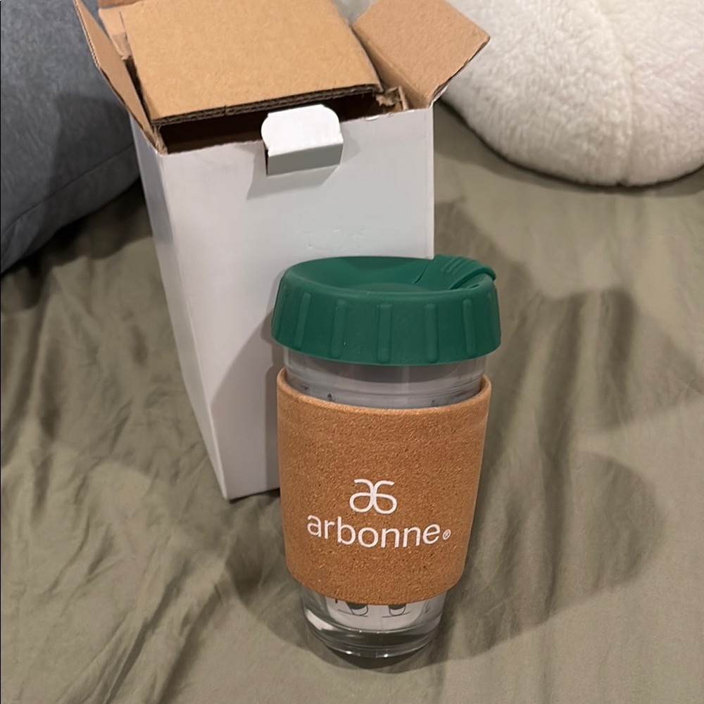 Arbonne Green and Tan Water Bottle for Dining